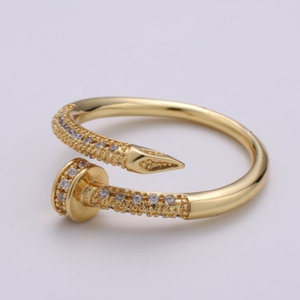Elegant Gold Spiral Nail Ring
